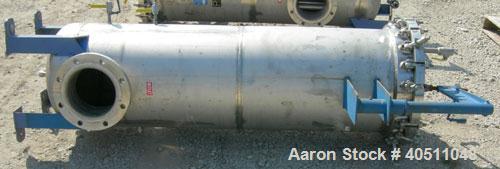 Used Pall Cartridge Filter Housing, part #P384SG29C2H2, 304 stainless steel. Approximately 18'' diameter x 60'' straight side, flat bolt on top, dished bottom. Internal rated 205 psi at 100 deg F, 22...