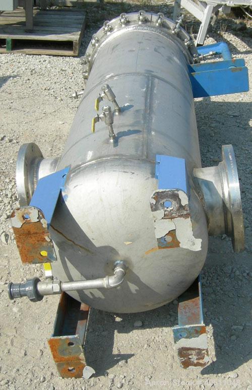 Used Pall Cartridge Filter Housing, part #P384SG29C2H2, 304 stainless steel. Approximately 18'' diameter x 60'' straight side, flat bolt on top, dished bottom. Internal rated 205 psi at 100 deg F, 22...