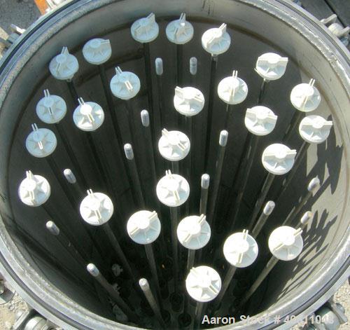 Used Pall Cartridge Filter Housing, part #P384SG29C2H2, 304 stainless steel. Approximately 18'' diameter x 60'' straight side, flat bolt on top, dished bottom. Internal rated 205 psi at 100 deg F, 22...