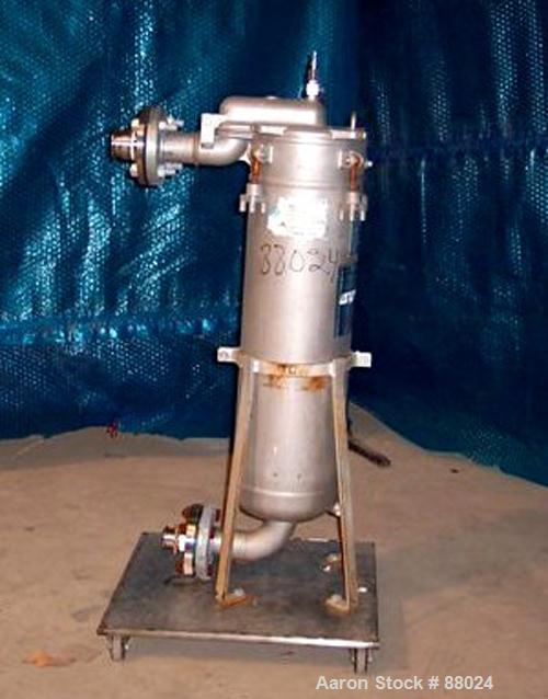 USED: RP Products liquid mesh basket filter, stainless steel. 8" diameter x 26" deep chamber rated 150 psi at 220 deg F. Single basket cartridge 7" diameter. Hinged top cover. Mounted on a base with ...