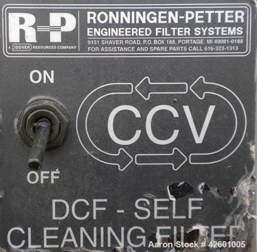 Used Ronningen-Petter Self Cleaning Mechanical Filter, model  DCF-400, 316 stainless steel. Flow rate 2-30 gallons per minute. Total capacity 0.94 gallon, purge capacity 4 fluid ounces, filtration su...