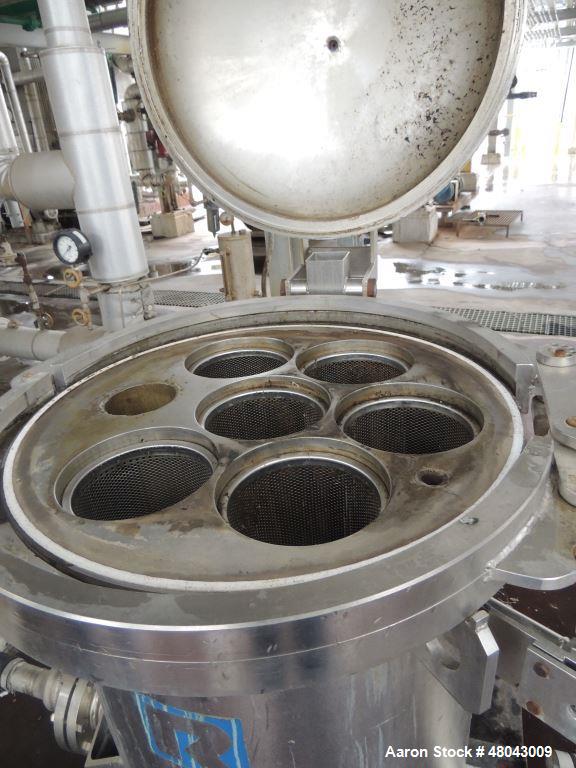 Used Rosedale Cartridge Filter. 304 Stainless steel with a Carbon steel Shell. Approximate 4" diameter flanges. Approximate 27" long strainer baskets.