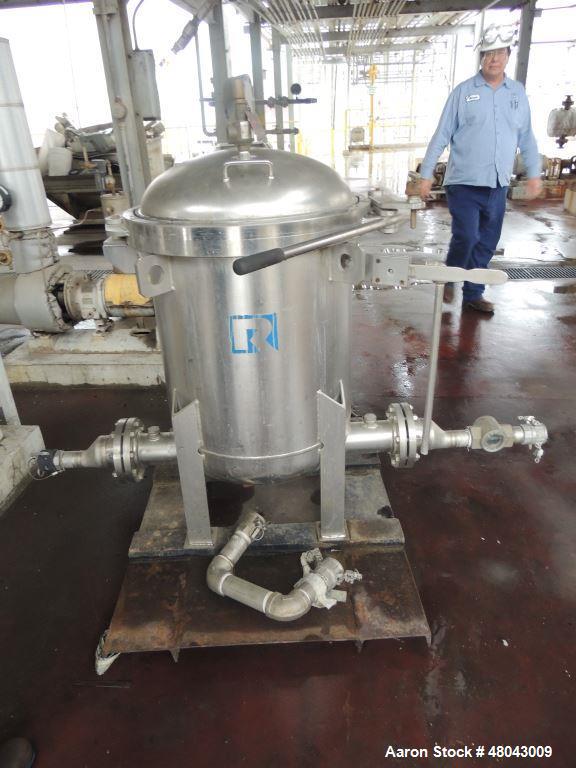 Used Rosedale Cartridge Filter. 304 Stainless steel with a Carbon steel Shell. Approximate 4" diameter flanges. Approximate 27" long strainer baskets.