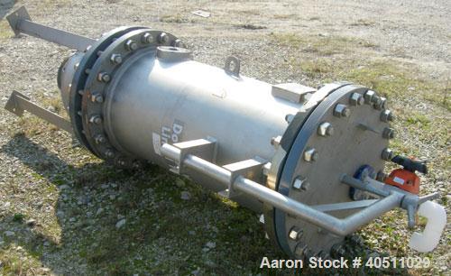 Used USF Filtration Separators Teflon Lined Filter, model T940450-000, type 120FH4-316L-6FD-C150-222ECTFE 90MILS, 316L stainless steel. Approximately 19.625'' x 52'' straight side. Flat bolt on top, ...