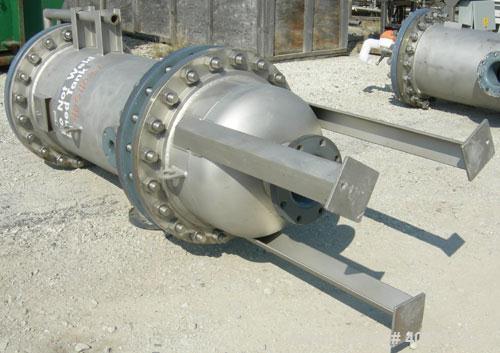 Used USF Filtration Separators Teflon Lined Filter, model T940450-000, type 120FH4-316L-6FD-C150-222ECTFE 90MILS, 316L stainless steel. Approximately 19.625'' x 52'' straight side. Flat bolt on top, ...