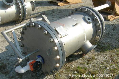 Used USF Filtration Separators Teflon Lined Filter, model T940451-000, type 180FH4-316L-6FD-C150-222ECTFE 90MILS, 316L stainless steel. Approximately 23.625'' x 54'' straight side. Flat bolt on top, ...