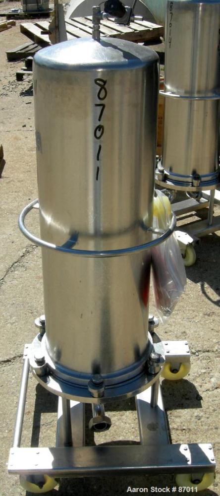 Used Valex Filter Housing, 316 Stainless Steel. 12-3/8" diameter x 35" straight side. Dish top, flat bolt-on bottom. 1-1/2" Inlet/outlet. Mounted on a stainless steel cart with casters.