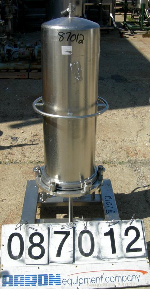 Used Valex Filter Housing, 316 Stainless Steel. 12-3/8" Diameter x 35" straight side. Dish top, flat bolt-on bottom. 1-1/2" Inlet/outlet. Mounted on a stainless steel cart with casters.