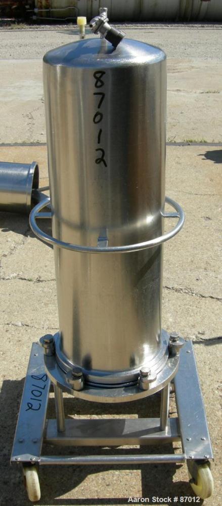 Used Valex Filter Housing, 316 Stainless Steel. 12-3/8" Diameter x 35" straight side. Dish top, flat bolt-on bottom. 1-1/2" Inlet/outlet. Mounted on a stainless steel cart with casters.