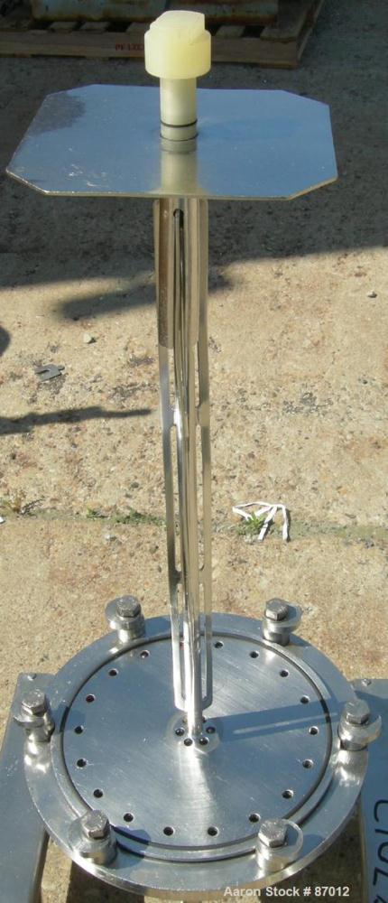 Used Valex Filter Housing, 316 Stainless Steel. 12-3/8" Diameter x 35" straight side. Dish top, flat bolt-on bottom. 1-1/2" Inlet/outlet. Mounted on a stainless steel cart with casters.