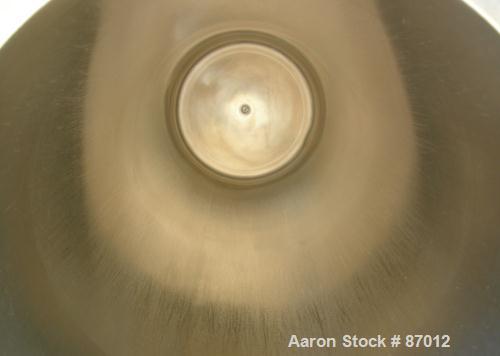 Used Valex Filter Housing, 316 Stainless Steel. 12-3/8" Diameter x 35" straight side. Dish top, flat bolt-on bottom. 1-1/2" Inlet/outlet. Mounted on a stainless steel cart with casters.