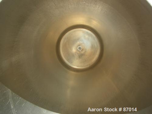Used Valex Filter Housing, 316 Stainless Steel. 12-3/8" Diameter x 35" straight side. Dish top, flat bolt-on bottom. 1-1/2" Inlet/outlet. Mounted on a stainless steel cart with casters.