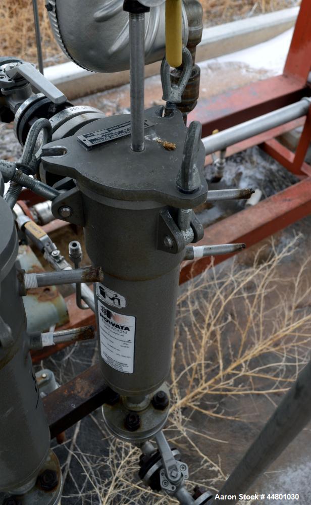 Used Nowata Filtration W4 Series Liquid Bag Filter Housing, Model W4UN12N30, 316 Stainless Steel. Flow rates to 50 gallons per minute, surface area 1 square foot, volume 130 cubic inches. Approximate...