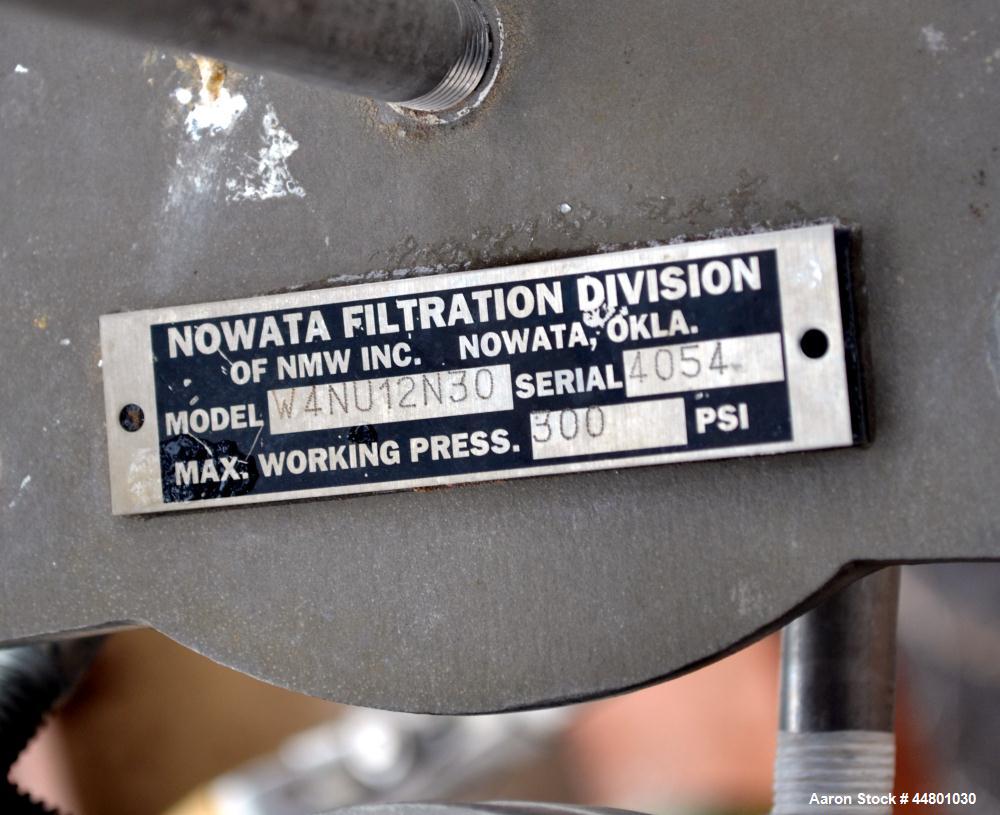 Used Nowata Filtration W4 Series Liquid Bag Filter Housing, Model W4UN12N30, 316 Stainless Steel. Flow rates to 50 gallons per minute, surface area 1 square foot, volume 130 cubic inches. Approximate...