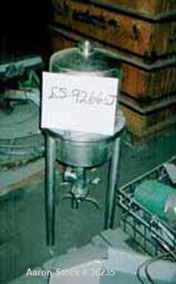 Used W.M. Sprinkman Raw Milk Filter, Stainless Steel. 12" Diameter x approximately 18" straight side, dish top and bottom. 2 section body. 2" diameter inlet/outlet. Mounted on 3 stainless steel legs.