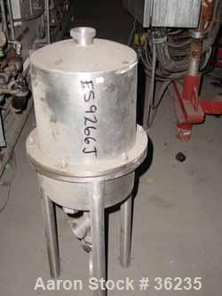 Used W.M. Sprinkman Raw Milk Filter, Stainless Steel. 12" Diameter x approximately 18" straight side, dish top and bottom. 2 section body. 2" diameter inlet/outlet. Mounted on 3 stainless steel legs.