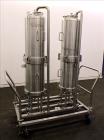 Used Cuno Dual Filter Skid, Model 12ZPB4, 316L Stainless Steel. (2) Cartridge filter housings, no filters, approximately 12-1/2