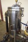 Used FSI Filter Specialists Double-Barreled Bag Filter, Model FSP-250, Carbon steel. Approximate 8.8 square feet surface area, maximum flow rate 150 gallons per minute. Each chamber approximate 8