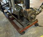 Used FSI Filter Specialists Double-Barreled Bag Filter, Model FSP-250, Carbon steel. Approximate 8.8 square feet surface area, maximum flow rate 150 gallons per minute. Each chamber approximate 8