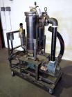 Used FSI Filter Specialists Double-Barreled Bag Filter, Model FSP-250, Carbon steel. Approximate 8.8 square feet surface area, maximum flow rate 150 gallons per minute. Each chamber approximate 8