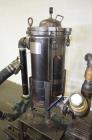 Used FSI Filter Specialists Double-Barreled Bag Filter, Model FSP-250, Carbon steel. Approximate 8.8 square feet surface area, maximum flow rate 150 gallons per minute. Each chamber approximate 8