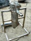 USED: Filtration Systems liquid mesh basket filter, model CF-8M, 316 stainless steel. Rated approx 220 gallons per minute. Non-jacketed housing 8