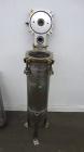 Used- Mechanical Basket Filter, 7 Gallon Capacity, 316 Stainless Steel, Vertical. Approximately 8-1/2” diameter x 29