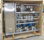 USED: Millipore filtering system consisting of: (1) Isopack biochromatography process column, 316L stainless steel. Approximate 1600mm diameter, rated 58 psi at 86 deg F. (2) Slurry transfer skids co...