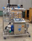 USED: Millipore filtering system consisting of: (1) Isopack biochromatography process column, 316L stainless steel. Approximate 1600mm diameter, rated 58 psi at 86 deg F. (2) Slurry transfer skids co...