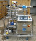USED: Millipore filtering system consisting of: (1) Isopack biochromatography process column, 316L stainless steel. Approximate 1600mm diameter, rated 58 psi at 86 deg F. (2) Slurry transfer skids co...