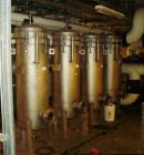 Used 3-L Cartridge Filter, Model FWFA-3840-F150, 304 stainless steel. Approximately 24