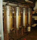 Used 3-L Cartridge Filter, model FWFA-3840-F150, 304 stainless steel. Approximately 24