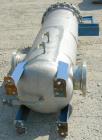 Used Pall Cartridge Filter Housing, part #P384SG29C2H2, 304 stainless steel. Approximately 18'' diameter x 60'' straight side, flat bolt on top, dished bottom. Internal rated 205 psi at 100 deg F, 22...