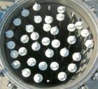Used Pall Cartridge Filter Housing, part #P384SG29C2H2, 304 stainless steel. Approximately 18'' diameter x 60'' straight side, flat bolt on top, dished bottom. Internal rated 205 psi at 100 deg F, 22...