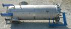 Used Pall Cartridge Filter Housing, part #P384SG29C2H2, 304 stainless steel. Approximately 18'' diameter x 60'' straight side, flat bolt on top, dished bottom. Internal rated 205 psi at 100 deg F, 22...