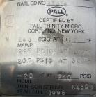 Used Pall Cartridge Filter Housing, part #P384SG29C2H2, 304 stainless steel. Approximately 18'' diameter x 60'' straight side, flat bolt on top, dished bottom. Internal rated 205 psi at 100 deg F, 22...