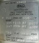 Used Pall Cartridge Filter Housing, part #P384SG29C2H2, 304 stainless steel. Approximately 18'' diameter x 60'' straight side, flat bolt on top, dished bottom. Internal rated 205 psi at 100 deg F, 22...