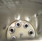Used Parker FulFlo Multi-Cartridge Filter, model FHS7T2FVP, 316L stainless steel. Typical flow rate 147 gallons per minute. 10'' diameter x 36'' deep vessel. Hinged top cover. Internal rated 150 psi ...