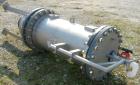 Used USF Filtration Separators Teflon Lined Filter, model T940450-000, type 120FH4-316L-6FD-C150-222ECTFE 90MILS, 316L stainless steel. Approximately 19.625'' x 52'' straight side. Flat bolt on top, ...