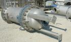 Used USF Filtration Separators Teflon Lined Filter, model T940450-000, type 120FH4-316L-6FD-C150-222ECTFE 90MILS, 316L stainless steel. Approximately 19.625'' x 52'' straight side. Flat bolt on top, ...