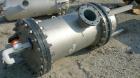 Used USF Filtration Separators Teflon Lined Filter, model T940451-000, type 180FH4-316L-6FD-C150-222ECTFE 90MILS, 316L stainless steel. Approximately 23.625'' x 54'' straight side. Flat bolt on top, ...