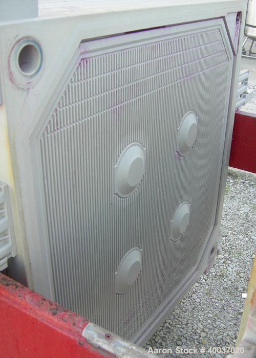 Used: Filter Press, 47" x 47". (51) 2 1/2" thick polypropylene plates, 1/2" recess. (1) head, (1) tail plate. 4 corner feed. Approximate 1325 square feet filter area, 48 cubic feet cake. Double hydra...