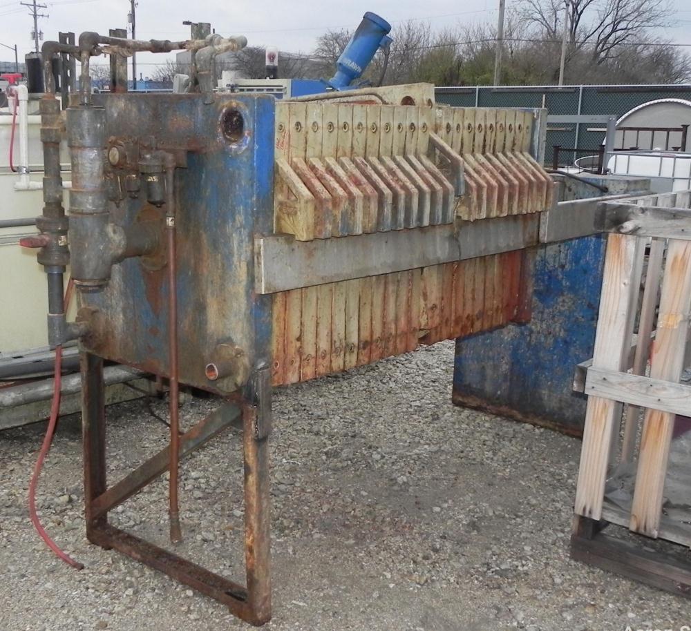Used Filter Press, 32" x 32". (21) Polypropylene plates, approximately 142.2 square feet filter area, 5.93 cubic feet cake capacity. (1) Head, (1) tail. Hydraulic closure device, center feed, four co...