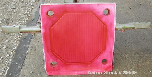 USED: Plate and frame filter press. 15 polypropylene plates 18" x 18" and 13 frames 18" x 18", 1" thick. Approximate 40 square feet capacity, approximate 1.47 cubic feet capacity. Corner feed, corner...