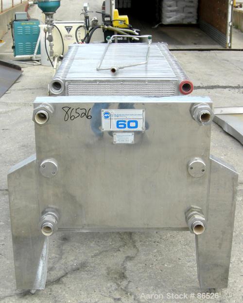 USED: APV Carlson polishing press, 304 stainless steel, 22 stainless steel plates 22 x 22. Approximately 370 square feet of filter area. 2" corner feed/discharge, Enerpac hydraulic closing device. Mo...