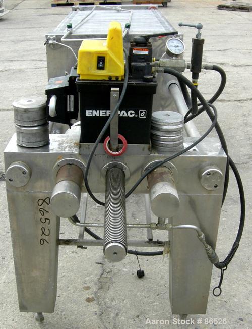 USED: APV Carlson polishing press, 304 stainless steel, 22 stainless steel plates 22 x 22. Approximately 370 square feet of filter area. 2" corner feed/discharge, Enerpac hydraulic closing device. Mo...