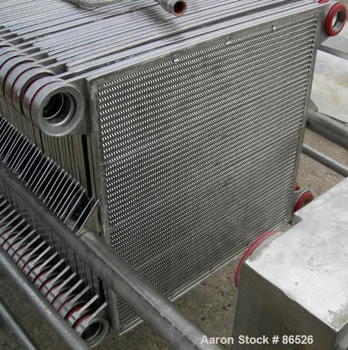 USED: APV Carlson polishing press, 304 stainless steel, 22 stainless steel plates 22 x 22. Approximately 370 square feet of filter area. 2" corner feed/discharge, Enerpac hydraulic closing device. Mo...