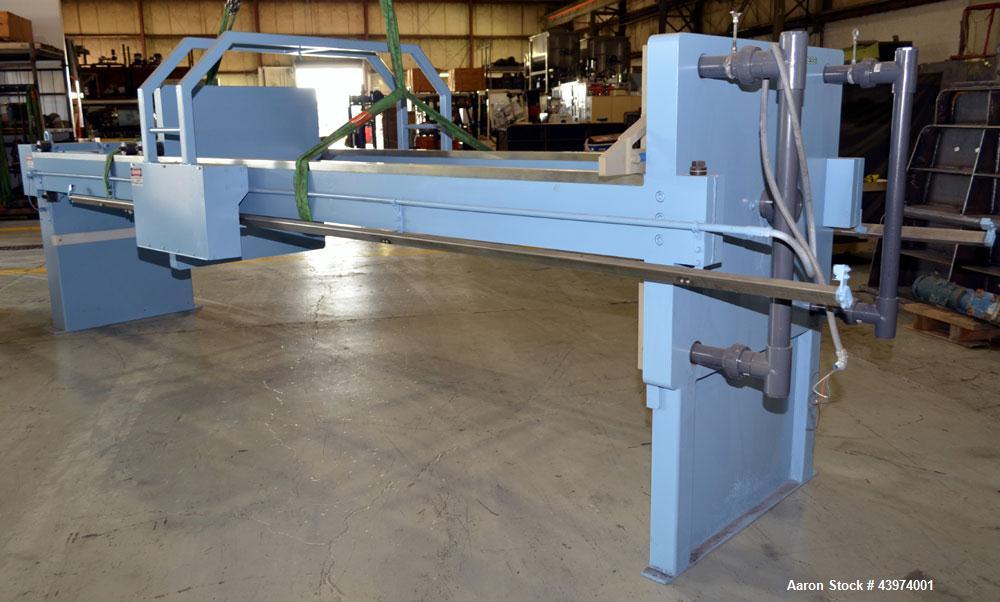 Used Beckart Environmental Hy-Pack Filter Press, Model 1000-40(60)A.  Carbon steel frame, (64) 39-1/4" x 39-1/4" x approximately 1/2" recess polypropylene plates, (1) head, (1) tail plate. Approximat...