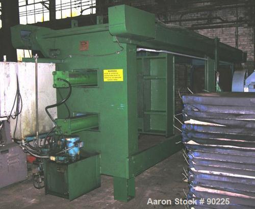 USED: Duro Filter Press, carbon steel frame. (36) 48" x 48" polypropylene plates, 43.75 cubic feet cake capacity, approximate 100 psi max filter pressure. Center feed 4 corner discharge, dual ram. Un...