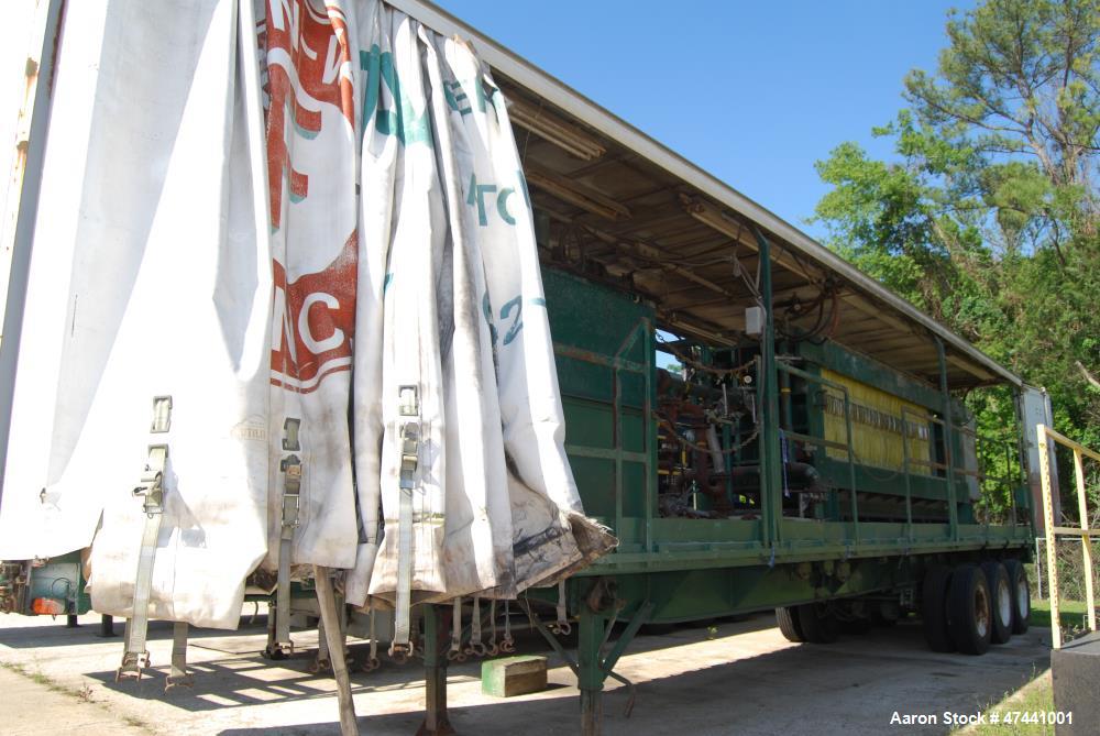 Used Durco Filter Press. QP1200/25-46/56.  Quadra press. (58) 48" x 48" Polyprop plates. Discharge conveyor. Trailer mounted.
